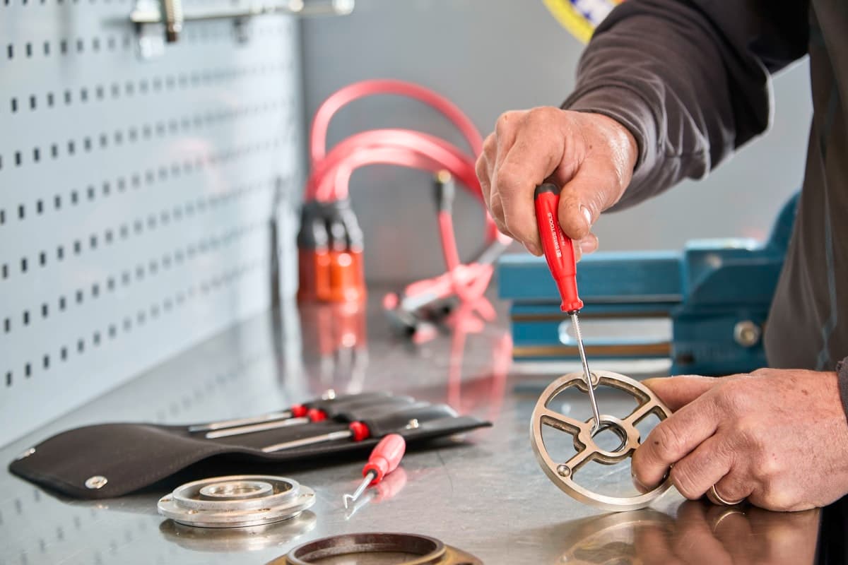 Mechanic working on repairs with professional tools