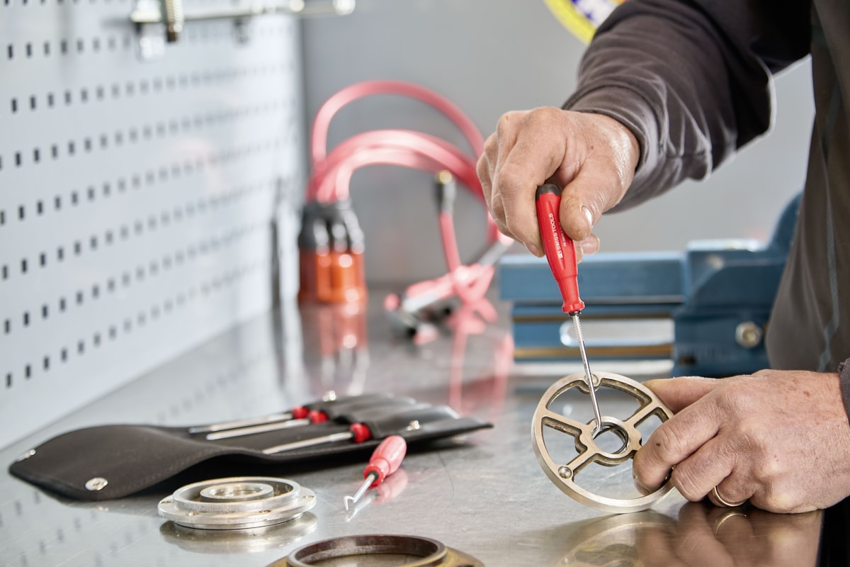 Mechanic working on repairs with professional tools